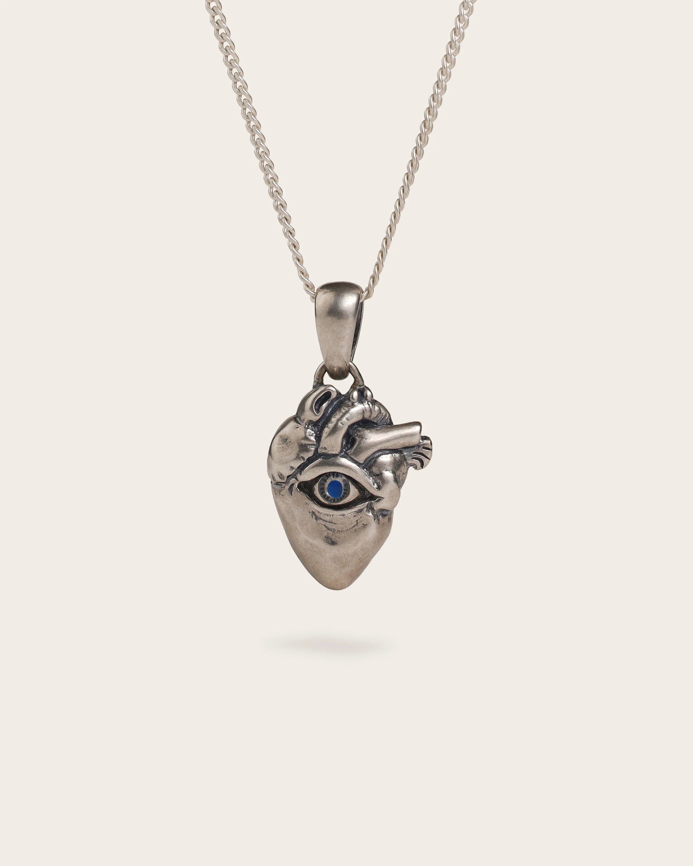 UNTOLD TRUTH / EYE HEART PENDANT