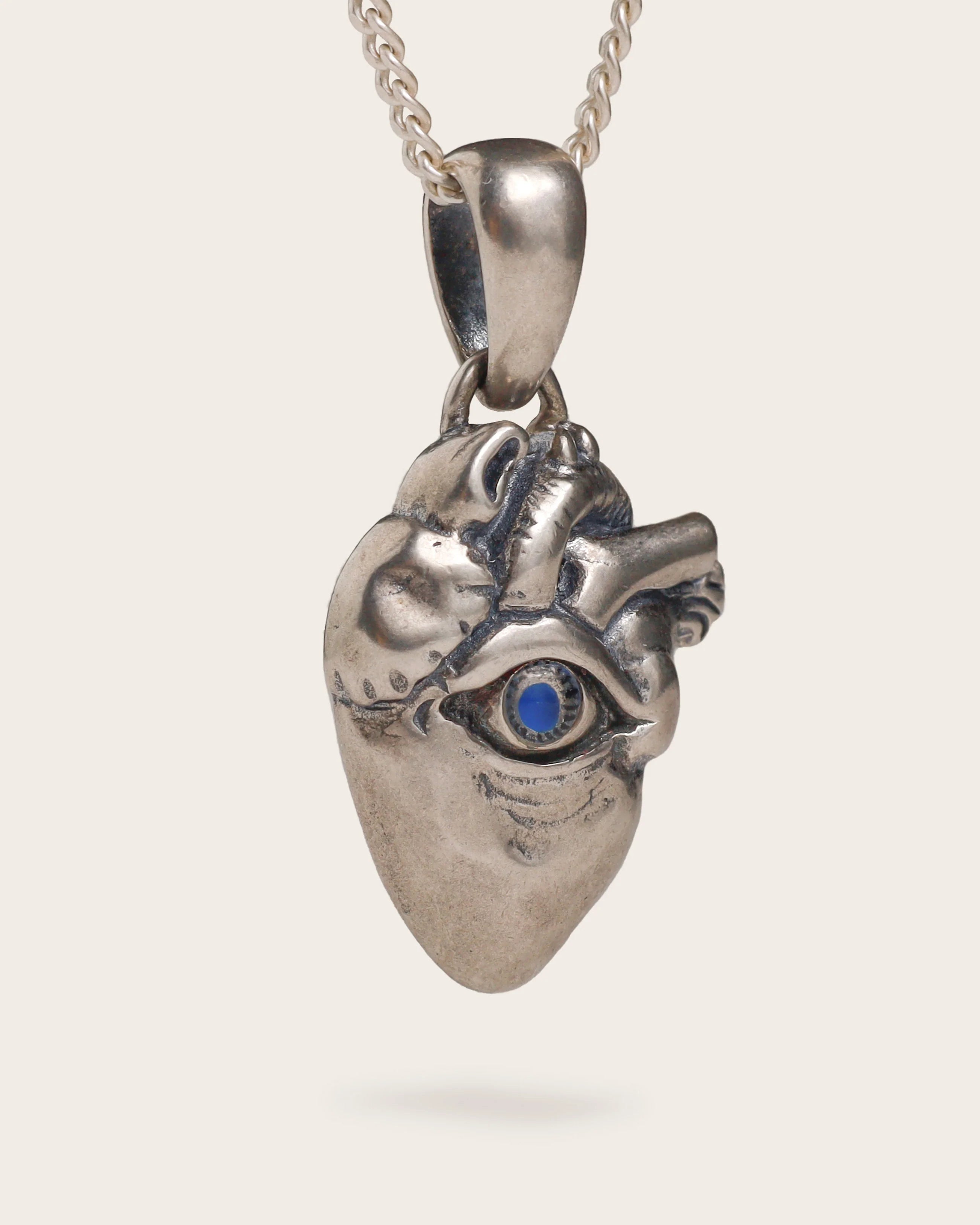 UNTOLD TRUTH / EYE HEART PENDANT