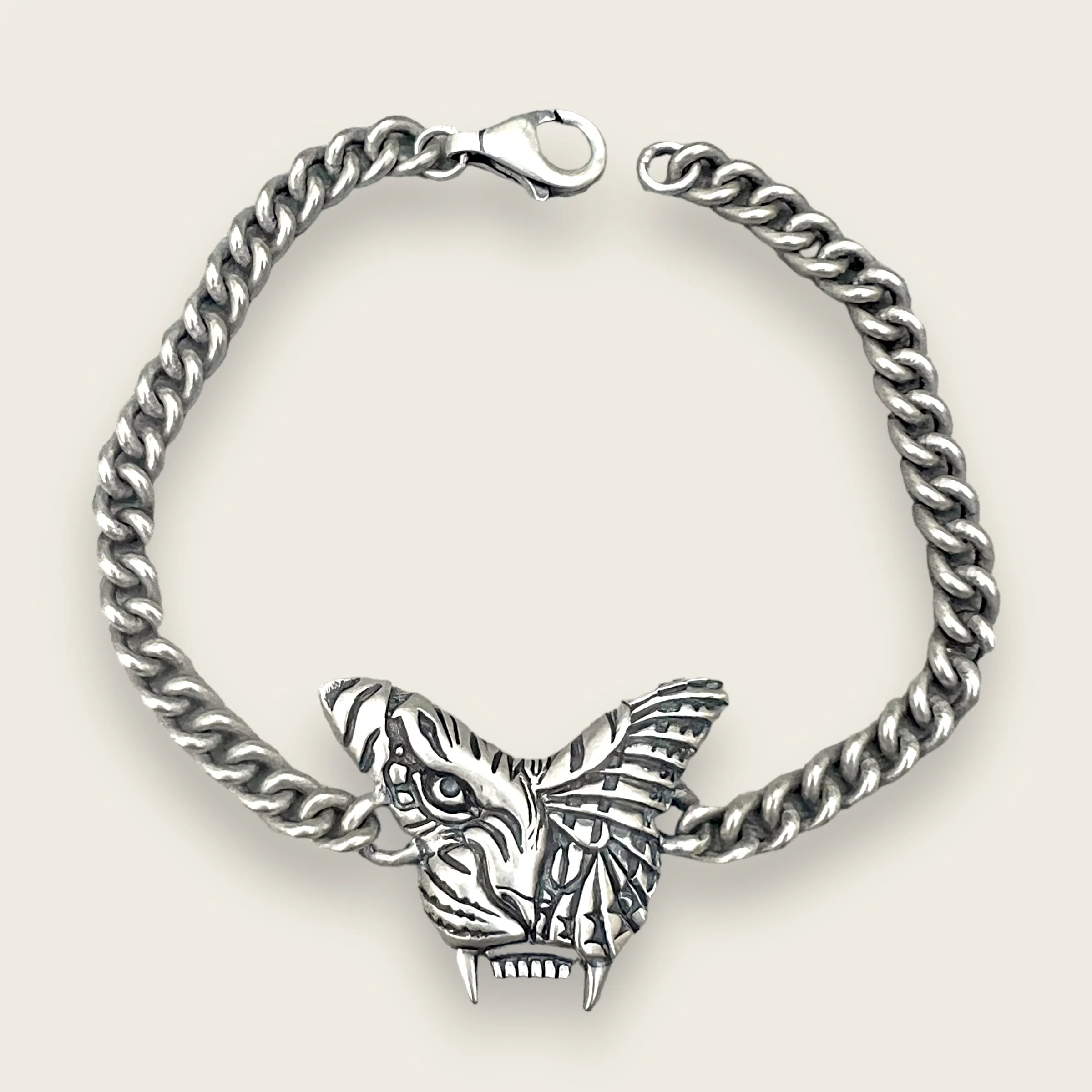 UNTOLD TRUTH / TIGER BUTTERFLY CURB BRACELET